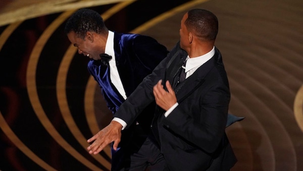 Wait, WHAT? Did Will Smith just slap Chris Rock on the Oscars stage?