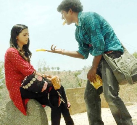 Bhavana and Puneeth Rajkumar in Jackie