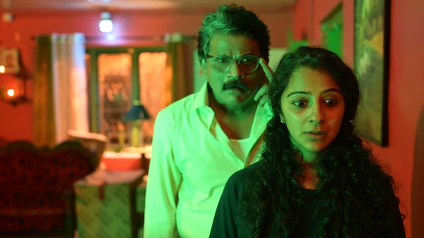 James Eliya and Darshana Rajendran in a still from Purusha Pretham