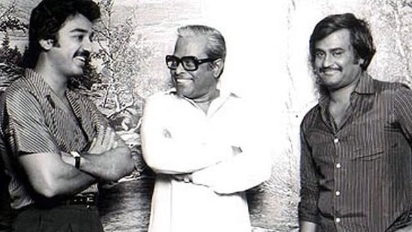 Haasan and Rajinikanth with K Balachander. Image via X, courtesy FilmHistoryPic.