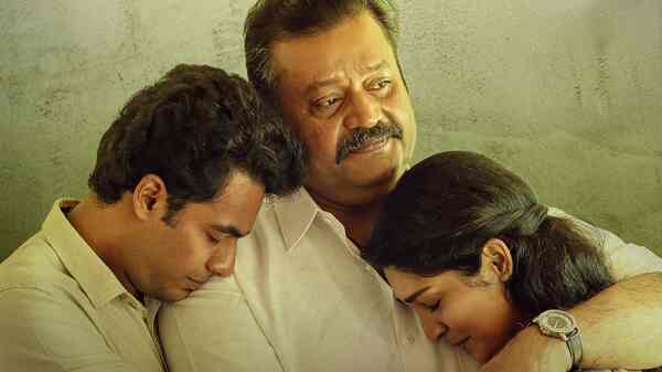 Evan Anil, Suresh Gopi and Rachel David in a poster from Kaaval