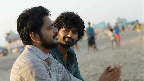 Kalesh Ramanand and Pranav Mohanlal in a still from Hridayam