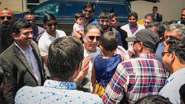 Kamal Haasan greets fans after arriving at San Diego for the Comic-Con