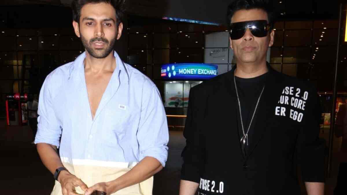 What rivalry? Kartik Aaryan and Karan Johar laugh and catch up at Mumbai airport, share a hug before parting ways – Watch