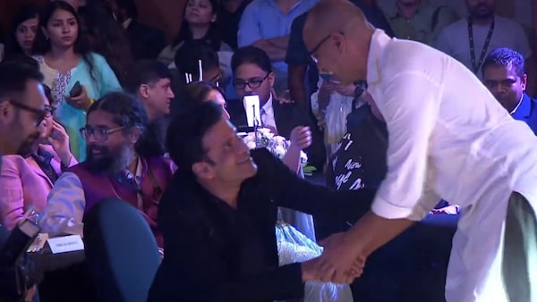 Kishore greeting Manoj Bajpayee