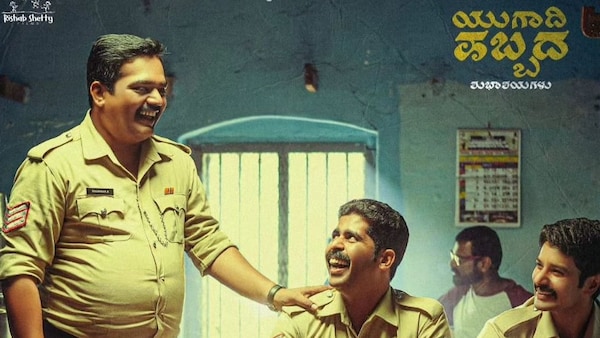 Pramod Shetty (left) in a still from Laughing Buddha