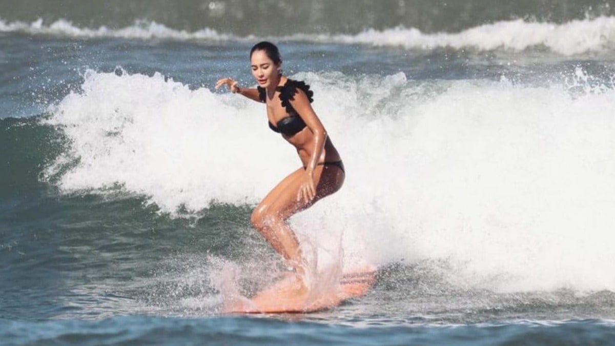 Lisa Haydon looks uber hot surfing like a pro in her bikini vacation photos from Bali