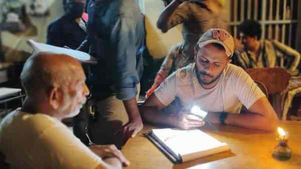 Mamukkoya and Irshad Parari on the sets of Kuruthi