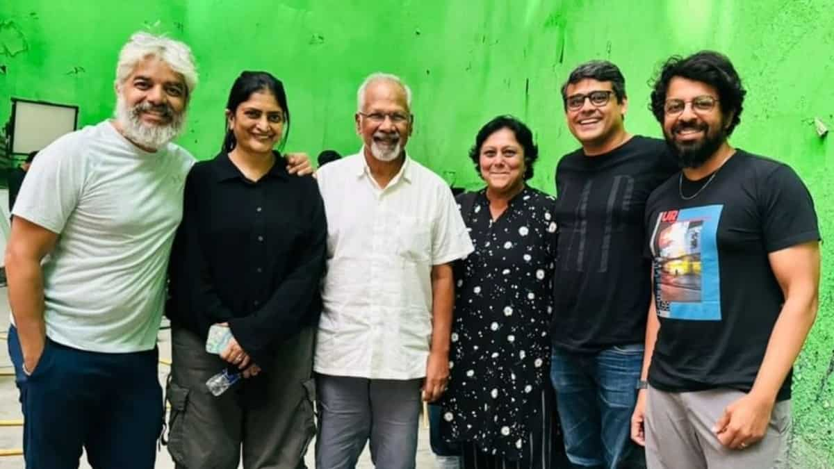 https://www.mobilemasala.com/film-gossip/Thug-Life-Mani-Ratnam-poses-with-Sudha-Kongara-and-others-location-pics-are-out-i293408