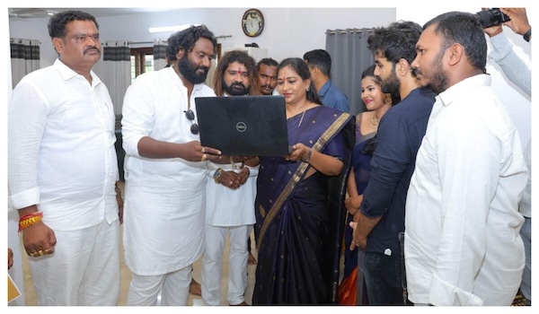 Home Minister launches Amma song