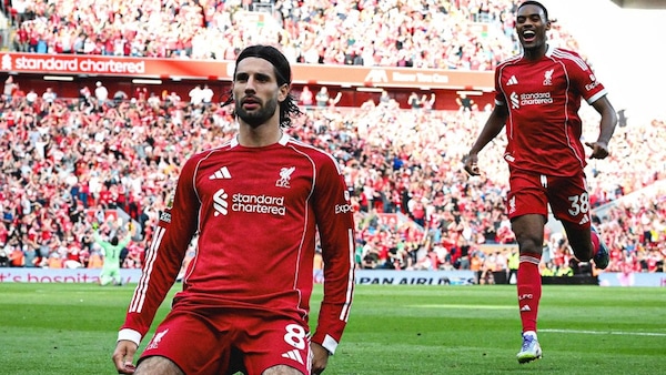 Stills from Liverpool vs Arsenal. Photos via Premier League