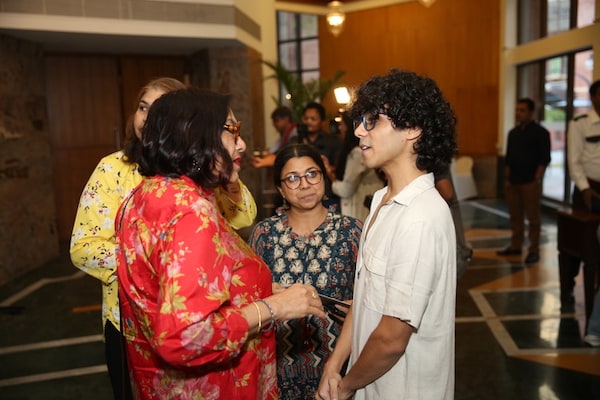 Mira Nair speaks with Achintya Bose at the fundraiser