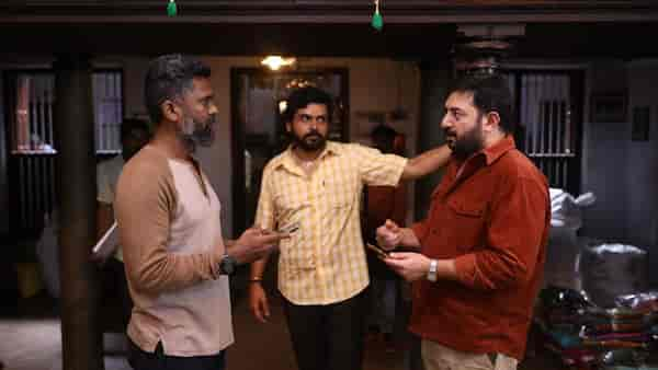 Filmmaker C Prem Kumar on the sets of Meiyazhagan with actors Karthi and Arvind Swami