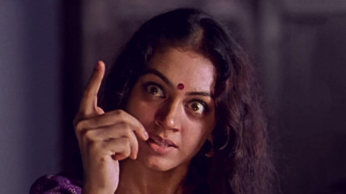 What was the name of the Tamil remake of the 1993 Malayalam film for which Shobana won a National Award for Best Actress?	