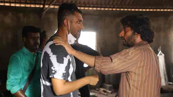 Sidharth with RJ Balaji during Sorgavaasal shoot.