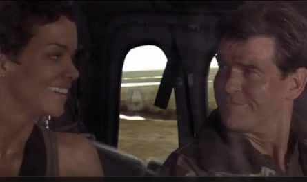 When filming a scene for the Bond film "Die Another Day" Pierce Brosnan saved Halle Berry from choking on what?