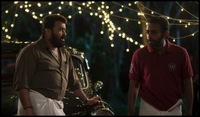 https://images.ottplay.com/images/mohanlal-arjun-ashokan-in-thudarum-1764849506.jpg