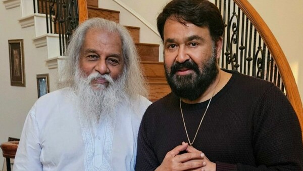 Amid Barroz post-production, Mohanlal catches up with KJ Yesudas in USA. See photos