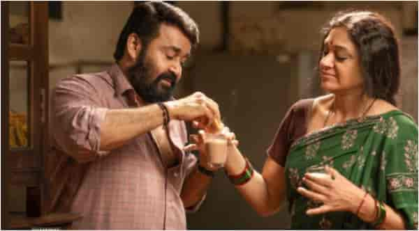 Mohanlal with Shobana in Thudarum poster