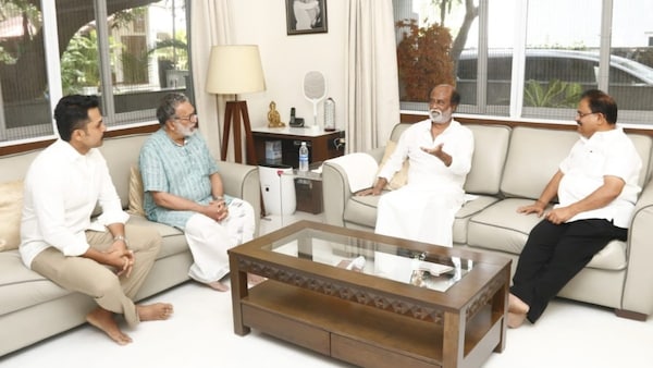 Nassar and Karthi meet Superstar Rajinikanth at his residence
