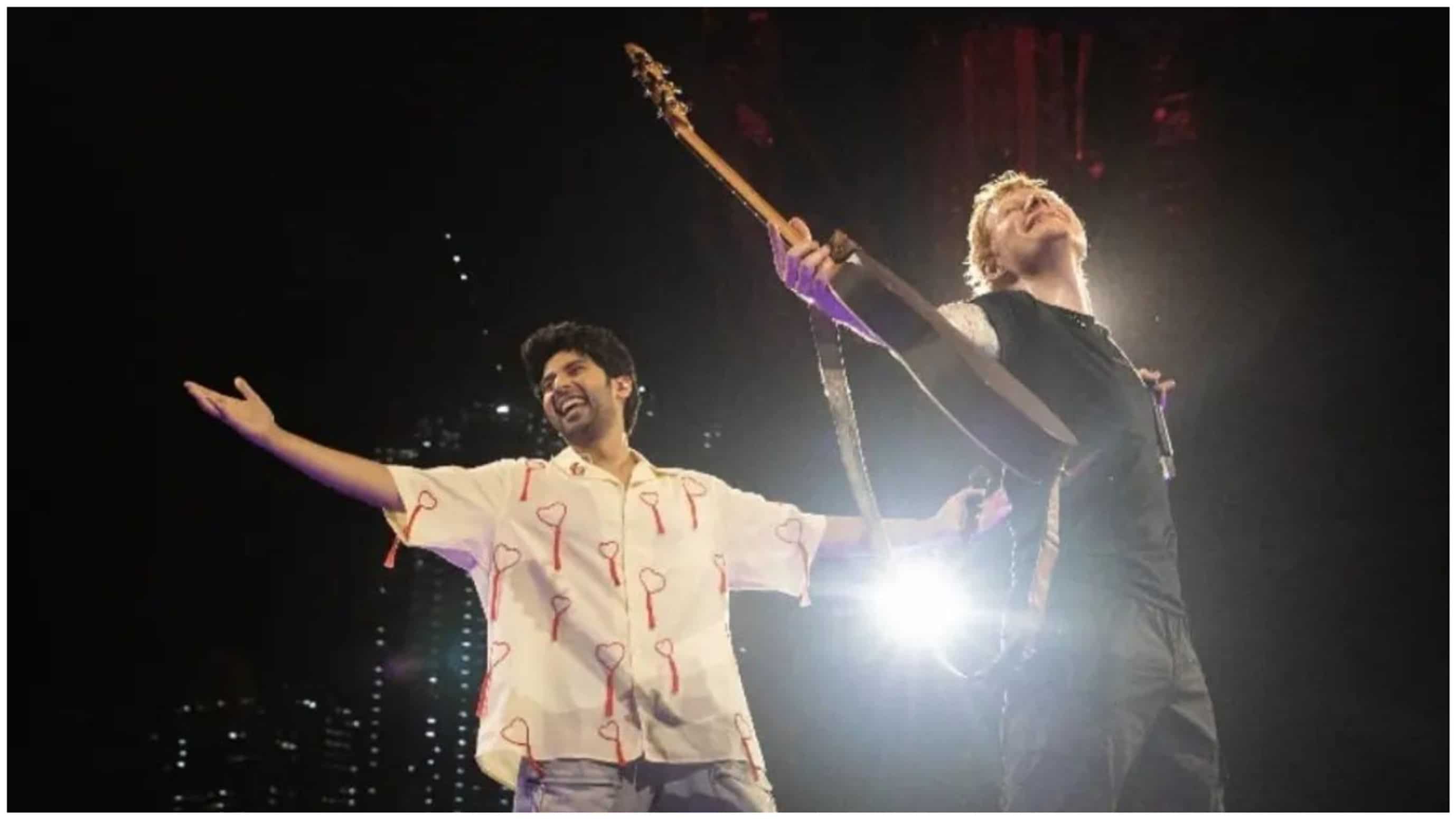 https://www.mobilemasala.com/film-gossip/Ed-Sheeran-Armaan-Malik-strike-Shah-Rukh-Khans-signature-pose-at-Mumbai-concert-together-Watch-i224461