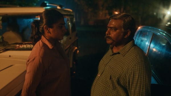 Nimisha Sajayan and Dibyendu Bhattacharya in a still from Poacher