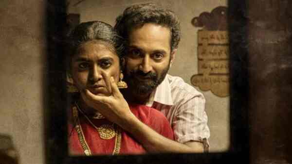 Nimisha Sajayan and Fahadh Faasil in a still from Malik