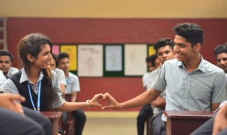 Which female actor in this film became an overnight social media phenomenon in 2018 when the Manikya Malaraya Poovi song released?
