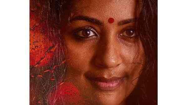 Navya Nair shares her character poster from the upcoming thriller Oruthee