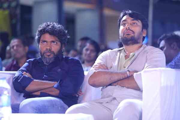 Pa Ranjith (left) at the audio launch of Natchathiram Nagargiradhu