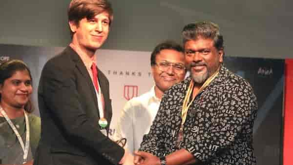 R Parthiban receiving a certificate from the World Records Union