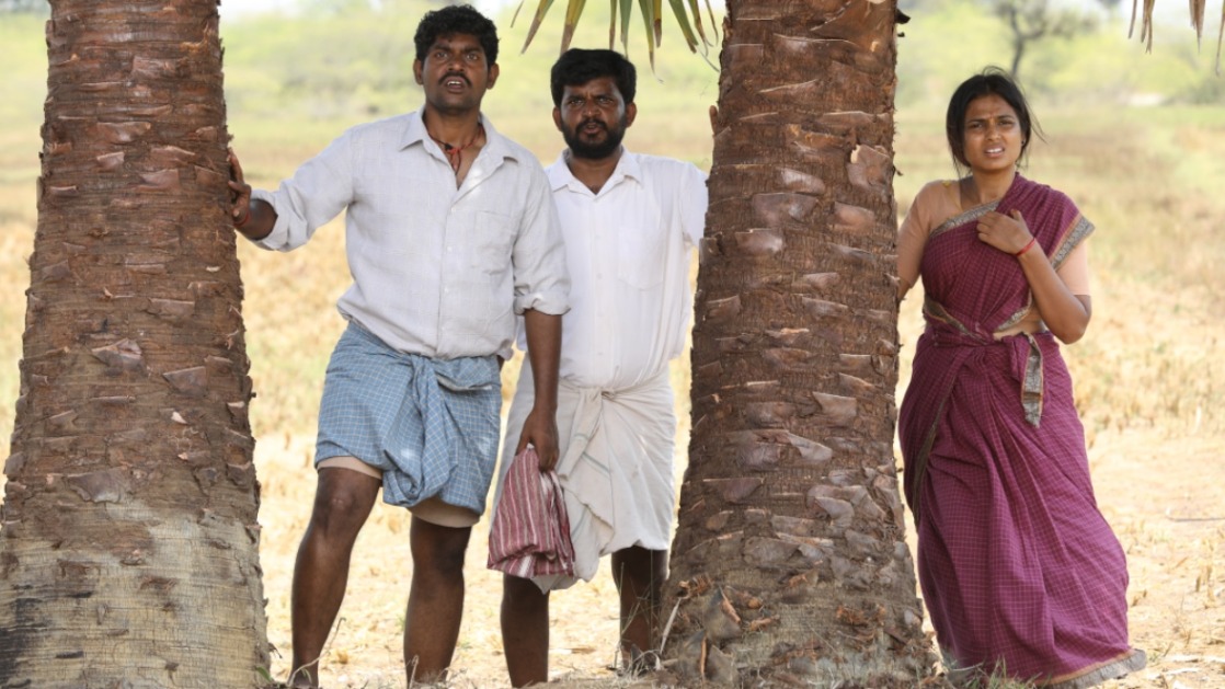 Mithun, Vadivel and Ramya in a still from the film