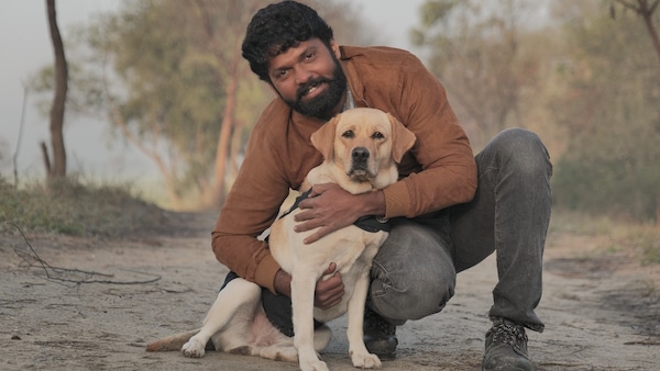 Rakshit Shetty and Charlie in 777 Charlie