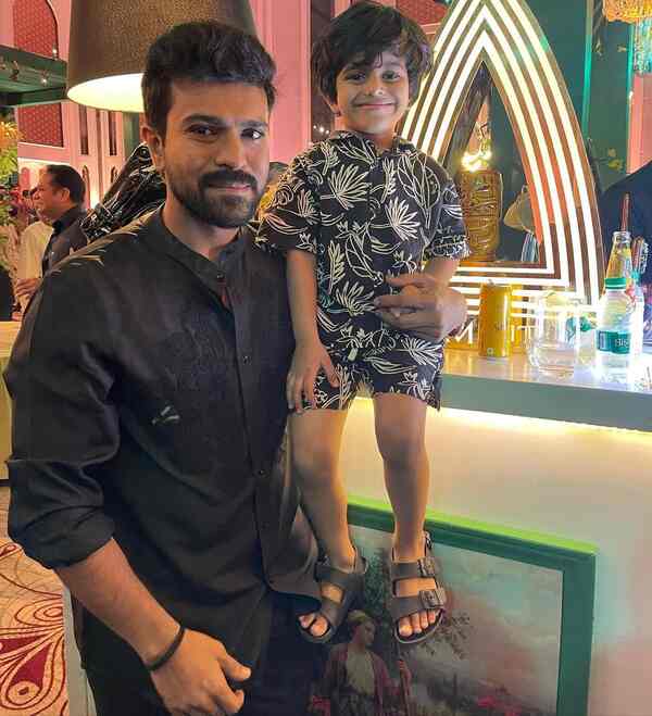 Ram Charan with a cute kid