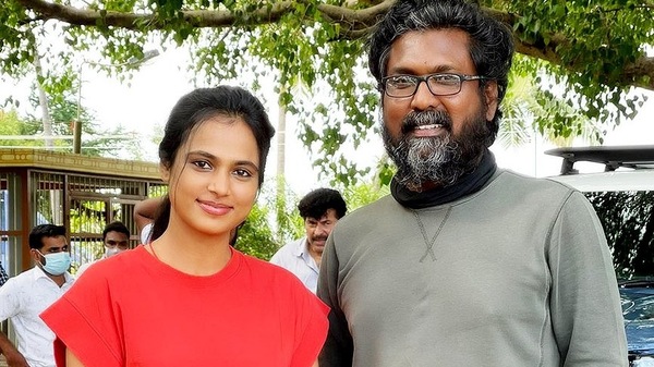 With Theni Eeswar