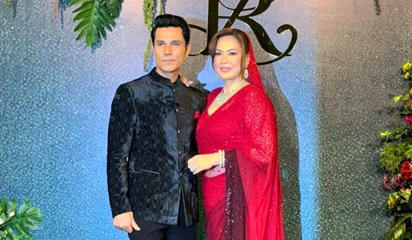 Randeep Hooda and Lin Laishram  – The newly wedded couple absolutely slaying in red & black at their wedding reception