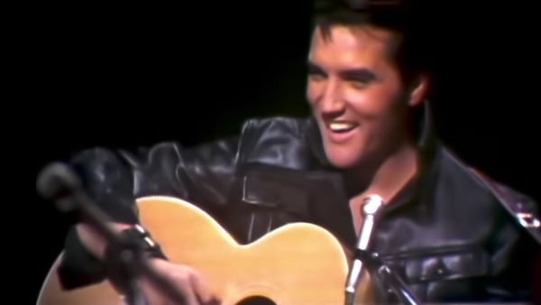 Archival footage of Elvis Presley from his 1968 Christmas special concert