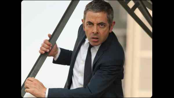 Rowan Atkinson as Johnny English