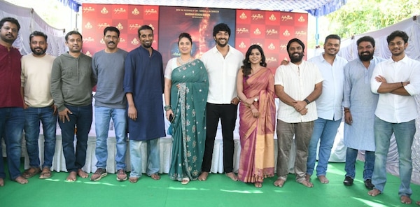 The team of Sanchith Sanjeev's debut film, #Sanchii01 at the film's muhurtha