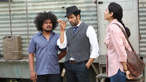 Pugazh, Santhanam and Riya Suman in a still from the film