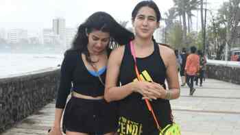 In Pics: Sara Ali Khan enjoys auto ride in rains with stylist ...
