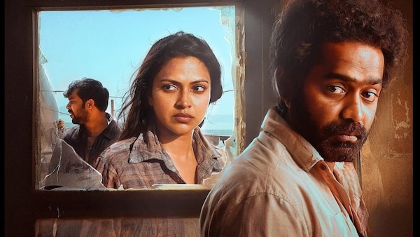 Sharafudheen, Amala Paul and Asif Ali in Level Cross