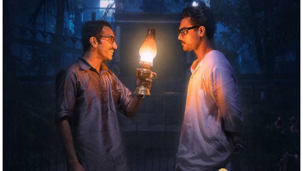 Shine Tom Chacko and Tovino Thomas in a still from Neelavelicham