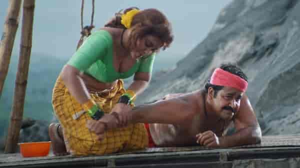 Silk Smitha and Mohanlal in a still from Spadikam