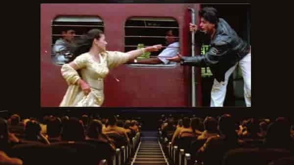 Still from DDLJ played in a cinema hall.