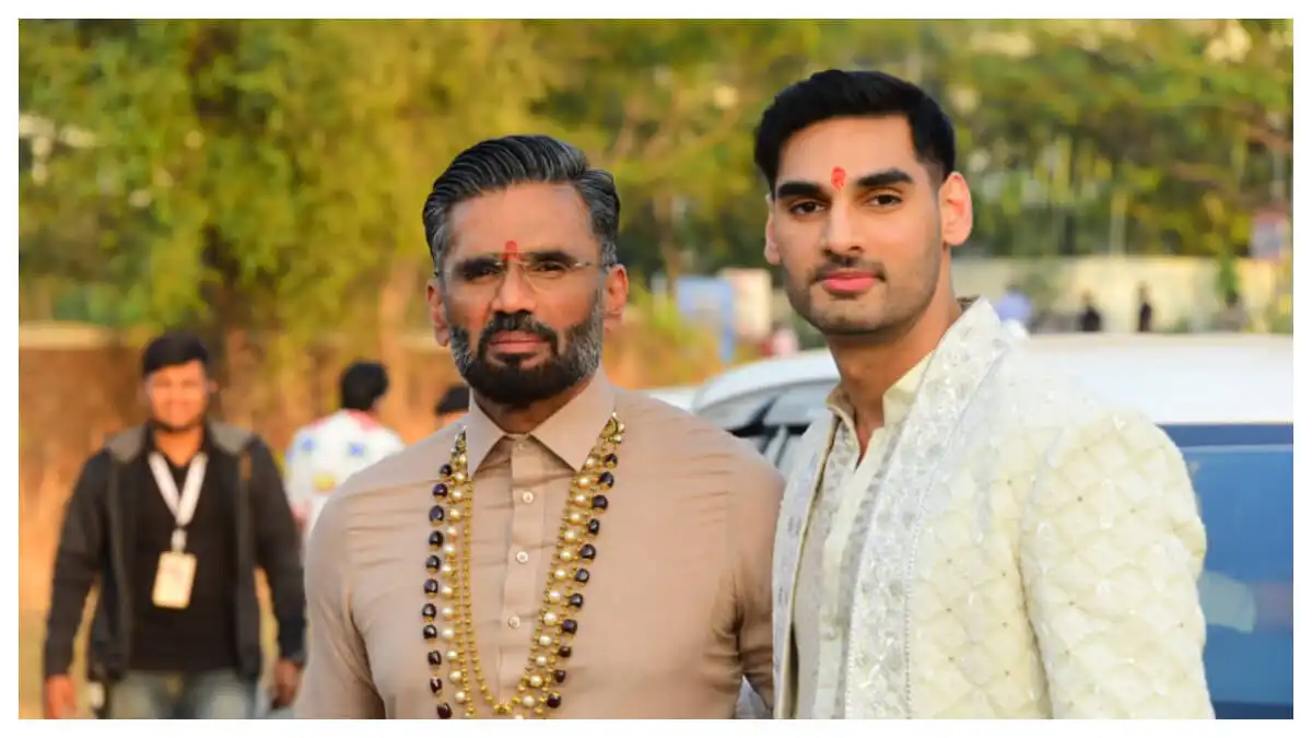 Athiya Shetty-KL Rahul wedding: Suniel Shetty and Ahan Shetty look dapper as they pose together, latter reveals the reception date
