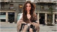 https://images.ottplay.com/images/tamannaah-bhatia-questioned-by-ed-1729229029.jpg