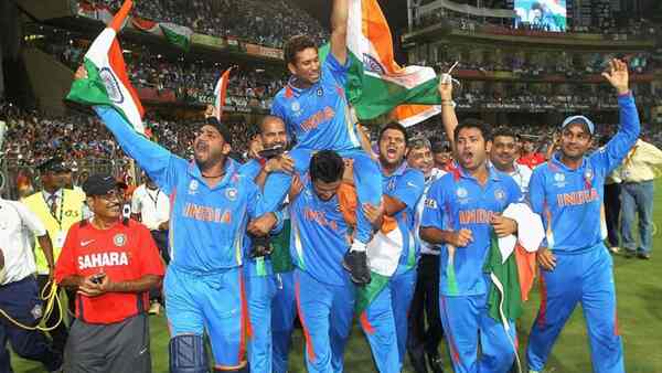 Team India on its victory lap as Virat Kohli carries Sachin Tendulkar on his shoulders