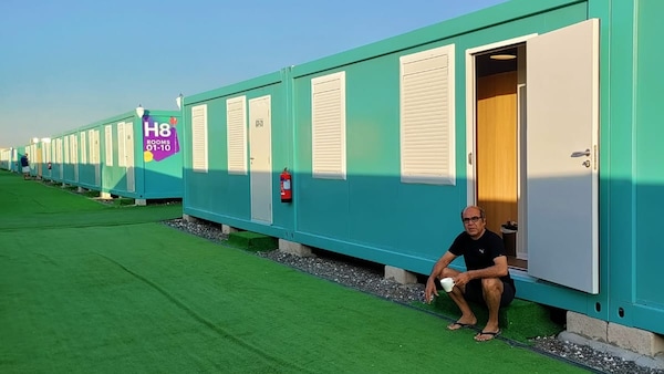 Thalaivasal Vijay watching FIFA World Cup in a container cabin