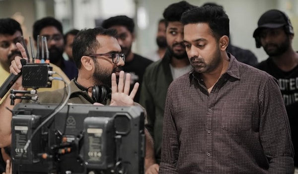 Thamar KV with Asif Ali on the sets of Sarkeet